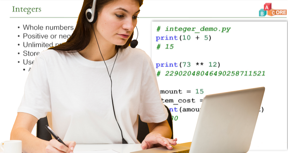 Course participant wearing headphones looking at a laptop screen, against a course slide as the background